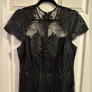 NWOT Beautiful wide leg Black Lace Jumpsuit from Venus PTP 18"